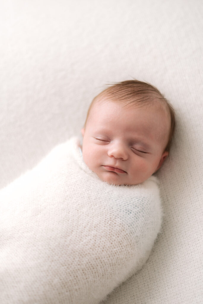 A baby sleeping at a Horsham Newborn Photography session