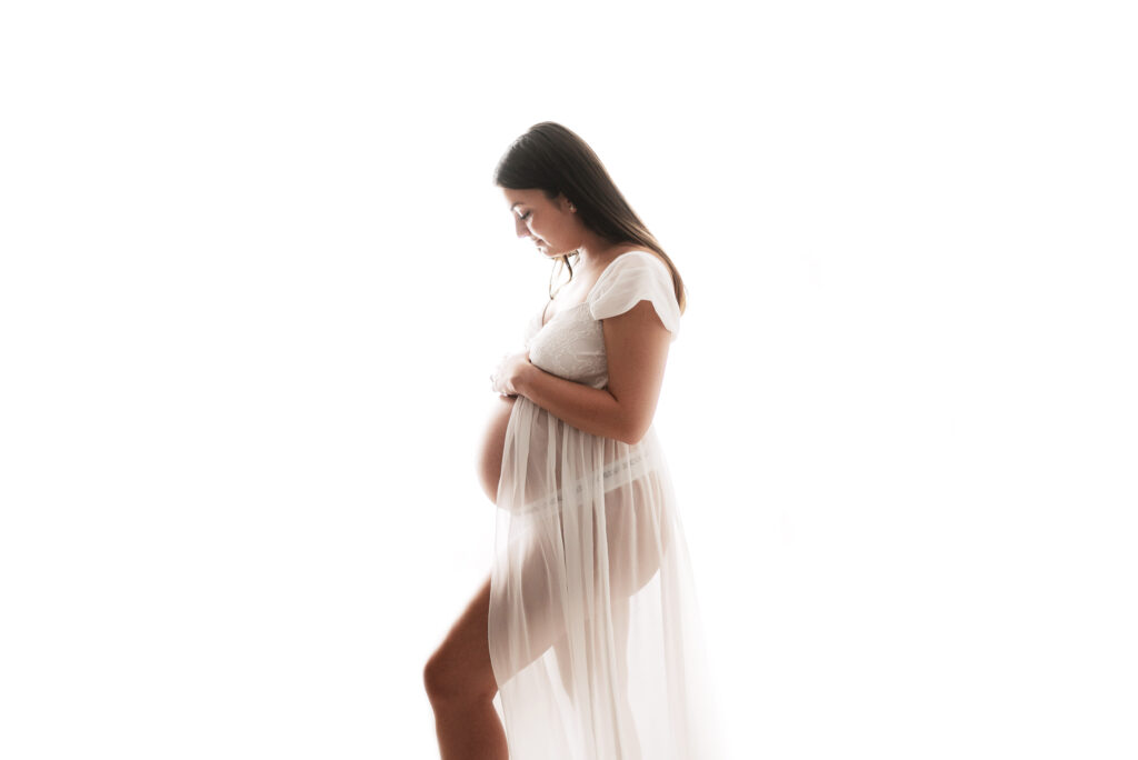 A pregnant mother at a horsham natural maternity photoshoot